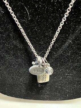 Origami Owl empowerment collection silver tone charm necklace.